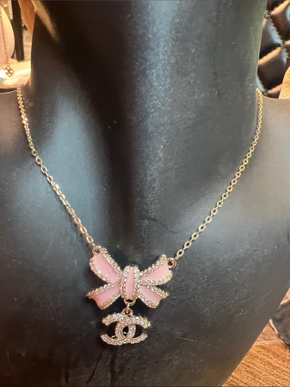 Pink Bow Pendant Necklace with Interlocking Charm